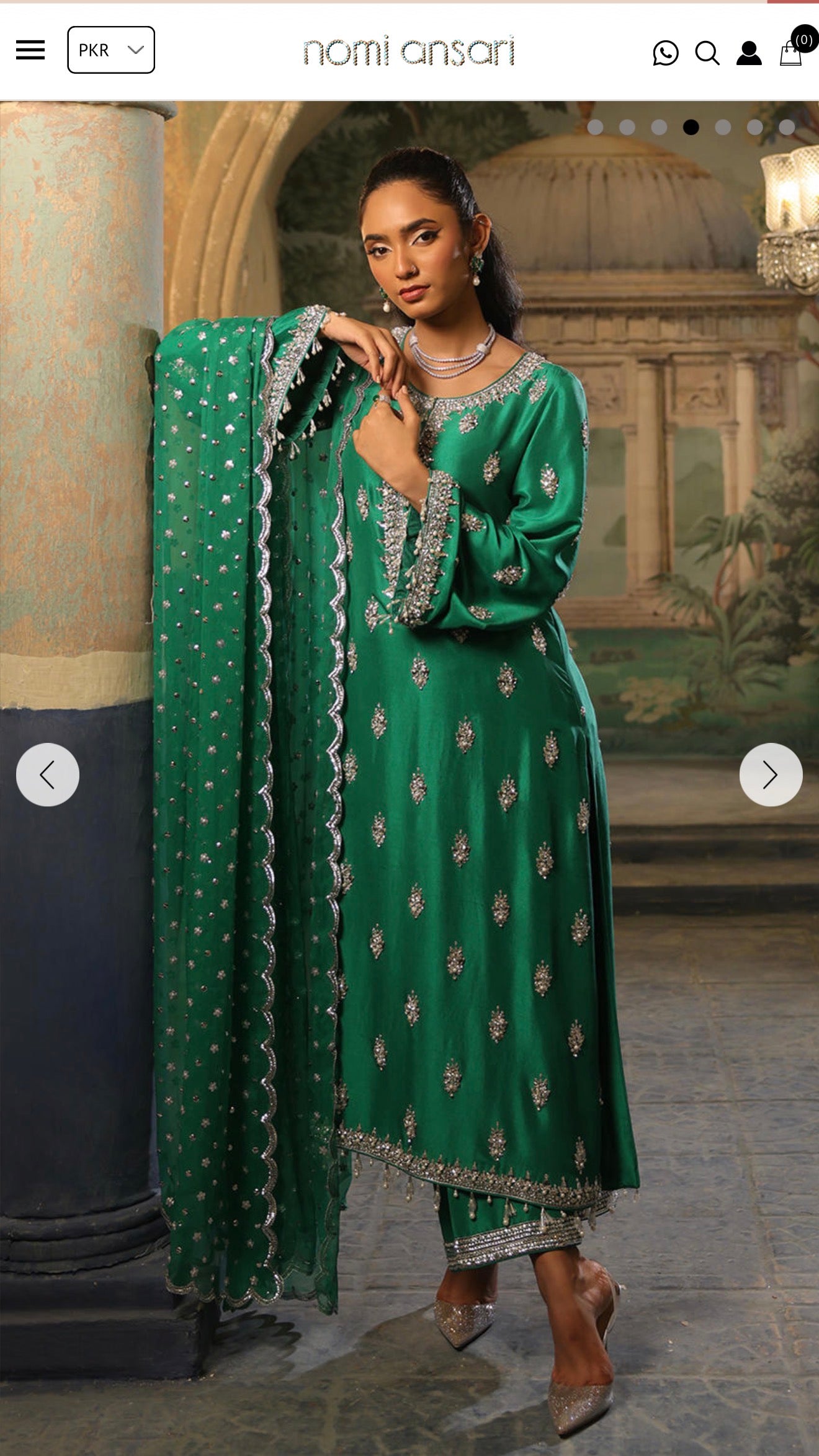 Nomi Ansari green suit